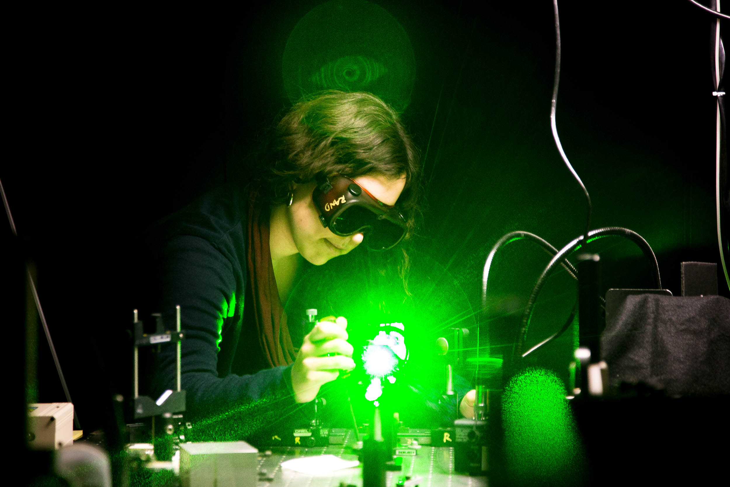student in a laser lab